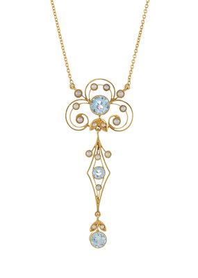 Lot 15 - An Edwardian 18ct gold aquamarine and pearl openwork necklace