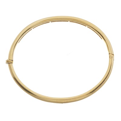 Lot 45 - An 18ct gold diamond line bangle bracelet