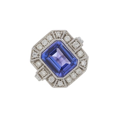 Lot 44 - An 18ct gold tanzanite and diamond cluster dress ring