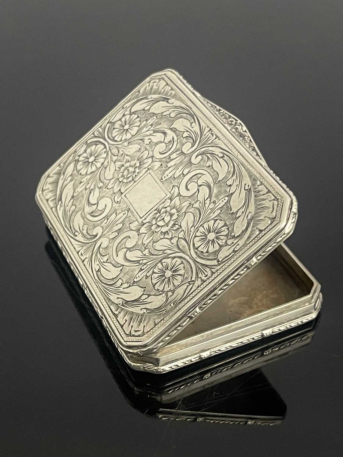 Lot 6 - A continental white metal pocket snuff box,