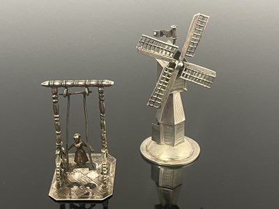 Lot 16 - Two Dutch silver novelty mechanical toys, one...