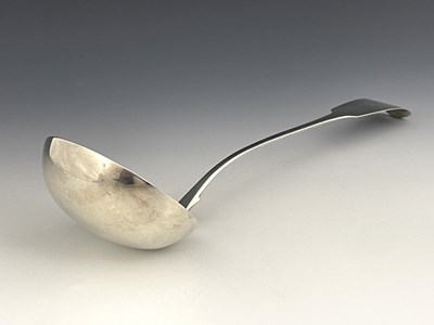 Lot 27 - A George III Irish silver soup ladle, John...