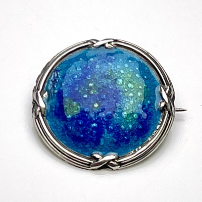 Lot 29 - An Arts and Crafts silver and enamelled brooch,...