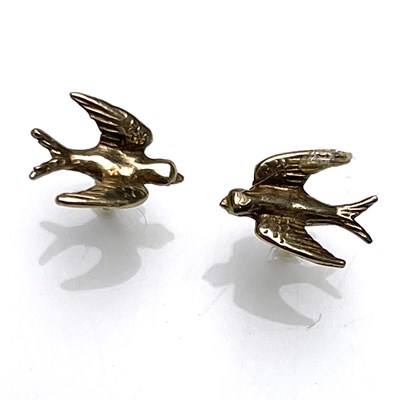 Lot 24 - A pair of 9 carat gold earrings in the form of...
