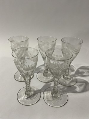 Lot 718 - Five George III Neoclassical wine glasses,...