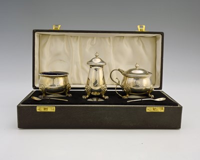 Lot 367 - An Elizabeth II silver three-piece condiment...