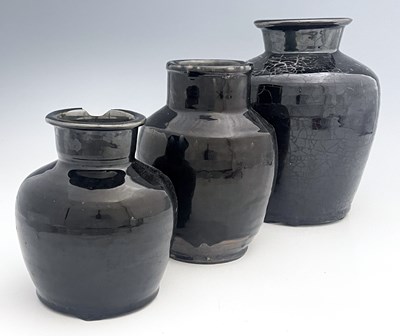 Lot 377 - Three Chinese monochrome glazed vases, Qing...