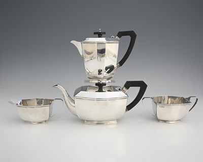 Lot 277 - A George V silver Art Deco four-piece tea and...