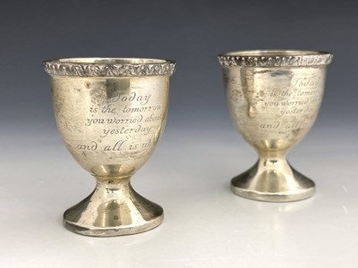 Lot 68 - A pair of Elizabeth II silver egg cups, HH,...