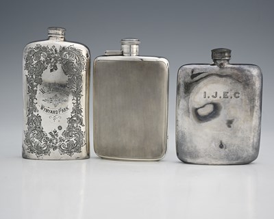 Lot 75 - A George VI silver hip flask, of rounded...