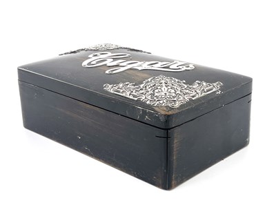 Lot 79 - An Edwardian silver mounted ebonised cigar box,...
