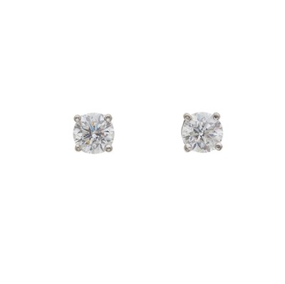 Lot 36 - A pair of 18ct gold diamond single-stone stud earrings