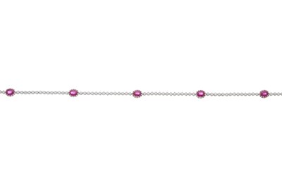 Lot 132 - An 18ct gold ruby and diamond line bracelet