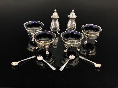 Lot 327 - A George V silver cased set of four salts,...