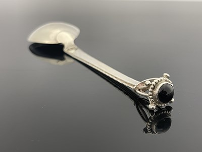 Lot 117 - An Arts and Crafts silver spoon, possibly...