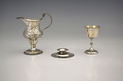 Lot 338 - A George III silver cream jug, of baluster...