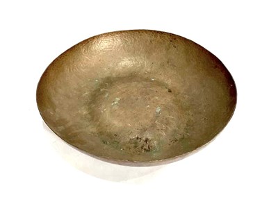 Lot 380 - An Arts & Crafts hammered copper bowl (1)