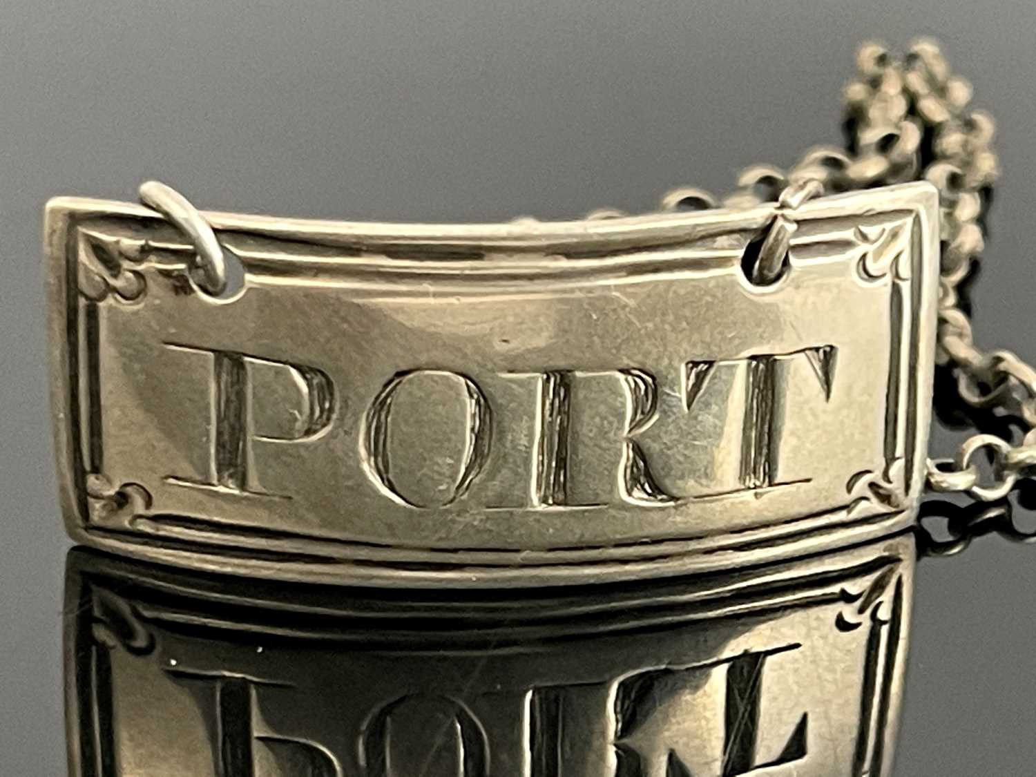 Lot 131 - A George III silver wine label for Port, John...