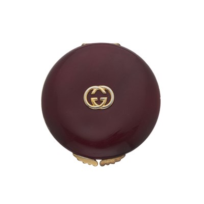 Lot 287 - Gucci, a vintage burgundy enamel powder compact