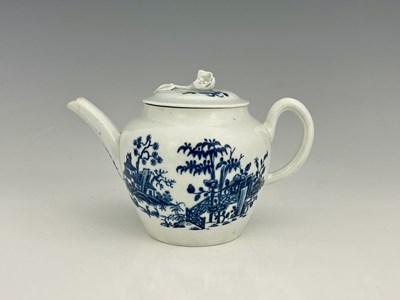 Lot 703 - A small Worcester blue and white teapot,...