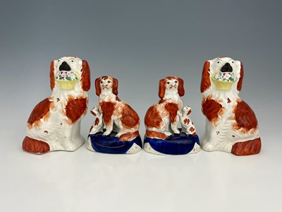 Lot 728 - Two pairs of Staffordshire dog figures, one...