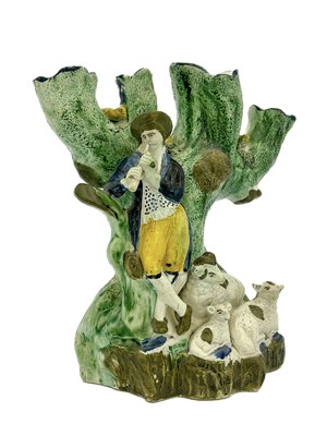 Lot 733 - A Staffordshire four branch Prattware tulip...