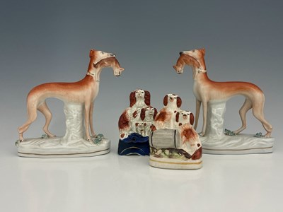 Lot 735 - A pair of Staffordshire pottery figures of...