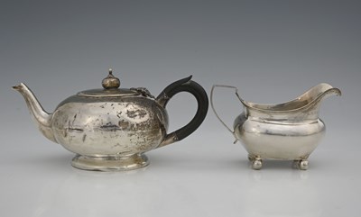 Lot 261 - A George III silver milk jug, of ogee form,...