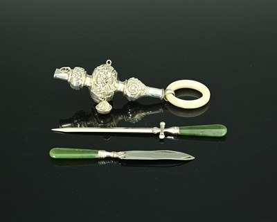 Lot 123 - An Edwardian silver baby's rattle, decorated...