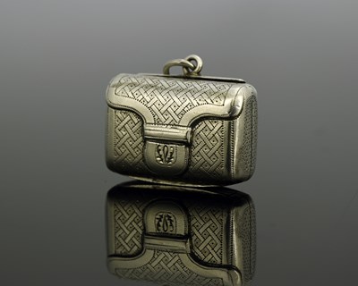 Lot 31 - A George III novelty silver satchel-form...