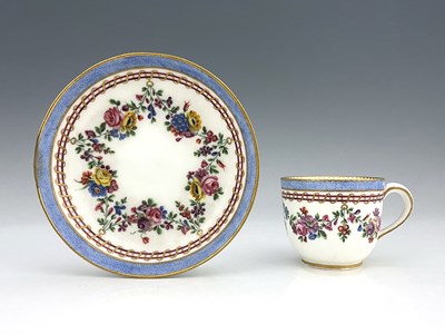 Lot 599 - A Sevres porcelain tea cup and saucer,...