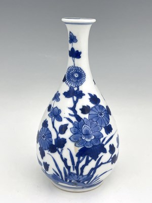 Lot 371 - An Oriental blue and white vase, teardrop...