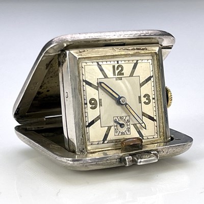 Lot 66 - An Art Deco silver cased travel watch, Sapho...