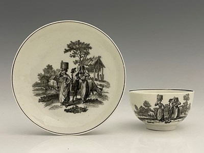 Lot 707 - A Worcester black and white printed tea bowl...