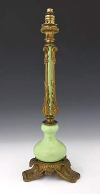 Lot 118 - A 19th Century French table lamp, green glazed...