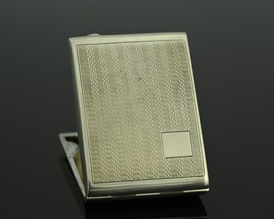 Lot 182 - A George V Art Deco silver matchbook holder,...