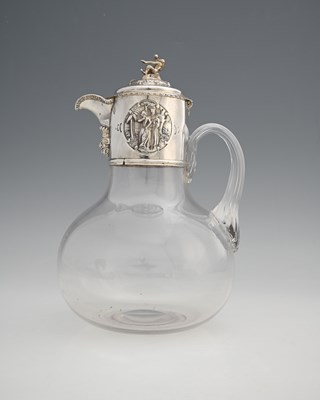 Lot 238 - A Victorian claret jug, mounted in silver, the...