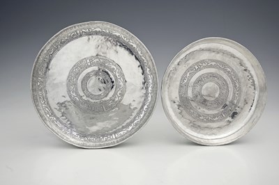 Lot 223 - Two Eastern silver-coloured metal graduated...