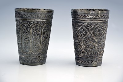 Lot 227 - Two white metal beakers, possibly Indian or...