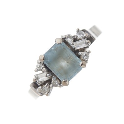 Lot 142 - An 18ct gold aquamarine and diamond dress ring