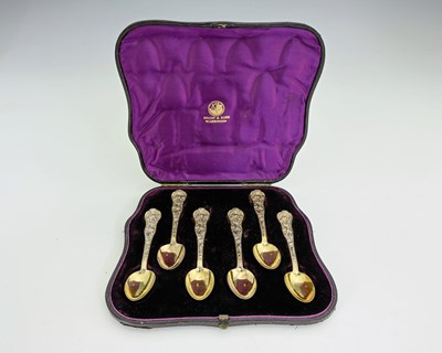 Lot 237 - A cased set of six Victorian silver-gilt...