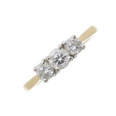 Lot 29 - An 18ct gold diamond three-stone ring