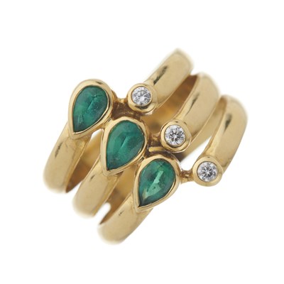 Lot 31 - An 18ct gold emerald and diamond dress ring