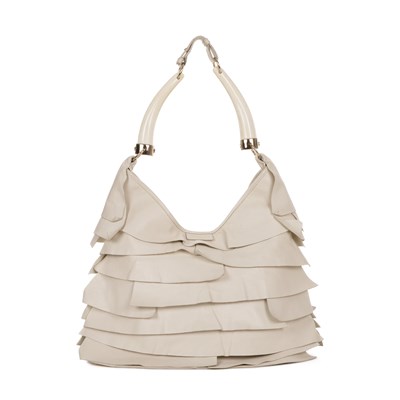 Lot 402 - Yves Saint Laurent, a cream St. Tropez ruffle handbag