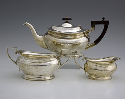 Lot 447 - A George V silver three-piece tea set,...