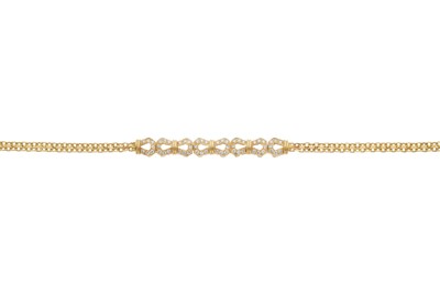 Lot 135 - An 18ct gold diamond bracelet