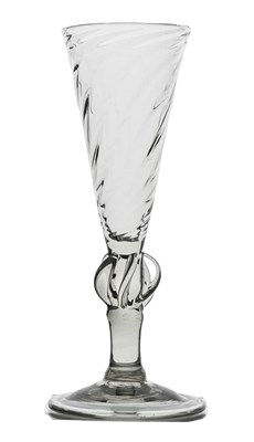 Lot 341 - A propeller knop glass ale flute, circa 1700,...