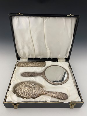 Lot 338 - An Elizabeth II cased silver-mounted dressing...