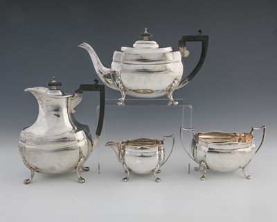 Lot 445 - A George VI silver four-piece tea and coffee...