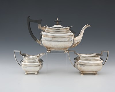 Lot 446 - A George V silver three-piece tea service,...